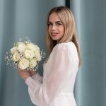 букет невесты из 11 белых роз